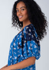 Floral Balloon Sleeve Tassel Tie Neck Blouse